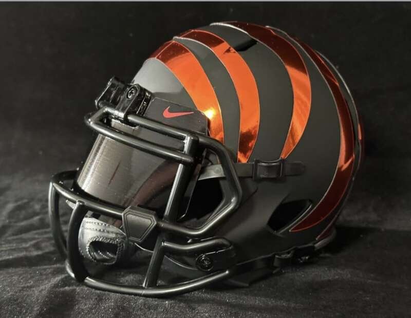 Cincinnati Bengals matte blackout with chrome orange stripes and visor!